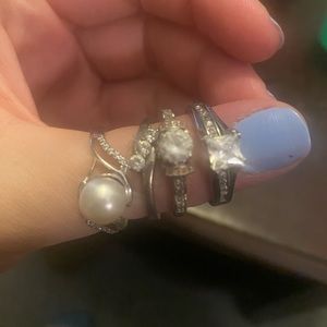 Lot of 4 sterling silver rings. All size 9